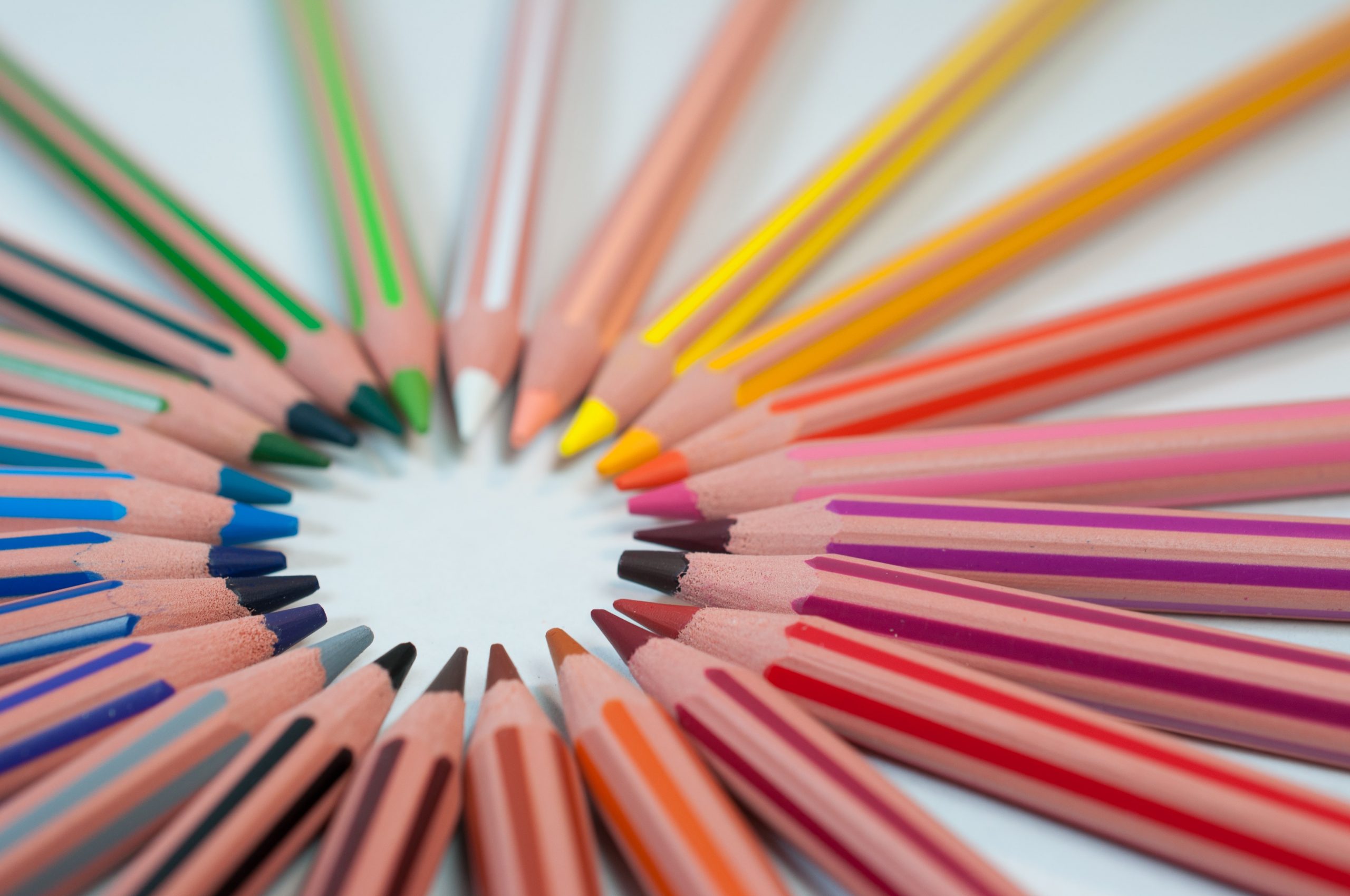 Pencil crayons in all colours creating a circle, used for background images